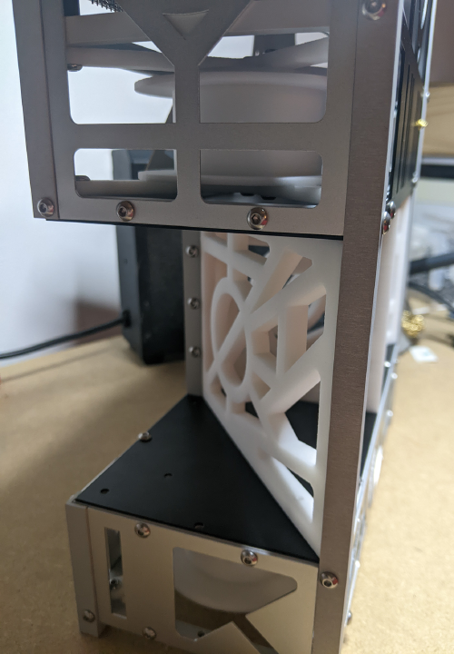 TX-2:MOONSHADOW, machined aluminum and SLS 3D printed 6U cubesat structure shown during development; design by Felipe Rebolledo; photo credit: Adriana Knouf (cell phone camera)